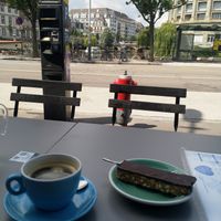 Black Americano and Vegan bretzel 🥨 slice  at Coffee Stub in Strasbourg