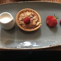 Raspberry and almond tart with soya cream  at The Swan Inn in Skipton