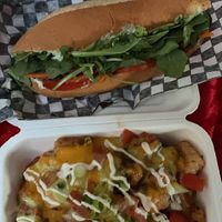 Tots and pesto sandwich  at Roughage Eatery in Winnipeg