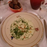 Starter of potato and leek soup, with truffle pieces and truffle ravioli at Pihlkjær in Aarhus