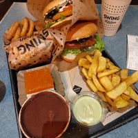 Burgers, fries, onion rings, lemon basil dip, tiramisu and orange cake at Swing Kitchen - Schwedenplatz in Vienna