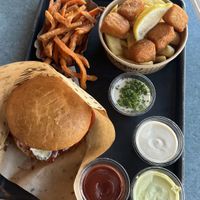 Bacon burger, fish and chips, and sweet potato fries    at Swing Kitchen - Schwedenplatz in Vienna