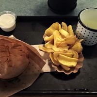Swing burger, farm fries, garlic sauce, soda. at Swing Kitchen - Schwedenplatz in Vienna