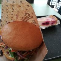 A burger with a vegan cheesecake at Swing Kitchen - Schwedenplatz in Vienna