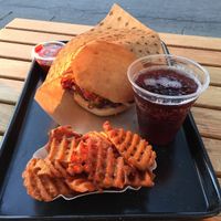 Cheeseburger meal with sweet potato fries and a cherry soda at Swing Kitchen - Schwedenplatz in Vienna