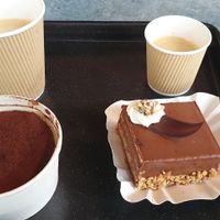 kaffee& Tiramisu & mandel-nougat at Swing Kitchen - Schwedenplatz in Vienna