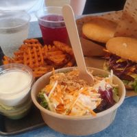 Burgers, Fries and Cole Slaw Salad at Swing Kitchen - Schwedenplatz in Vienna