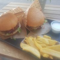 Swing and cheeseburger and fries. I think it was like 6,50 and 6,70 for the burgers and 3,40 for the fries. The lemon mayo was 0,90. at Swing Kitchen - Schwedenplatz in Vienna