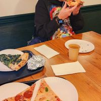 My mom got a slice with mushrooms artichokes and something else...  😍 at 20th Street Pizza in Philadelphia