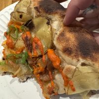 Hot potato! Spicy thinly sliced potato slice. drop  at 20th Street Pizza in Philadelphia