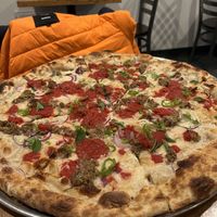 Ignore my imaginary friend. I tried and failed to smash this bad boy all by myself    at 20th Street Pizza in Philadelphia