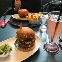 beyond burger with strwaberry lemonade and fried at Helvti Diner - Bellevue in Zurich