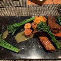 Vegan “surf and turf” (trumpet mushroom “scallops” and “prime rib” from Herbivorous Butcher) at Cosmos in Minneapolis