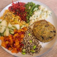 Platter: 'Fish' Cake Served With A Selection Of Salads at Dragonfly Bistro in Aberystwyth