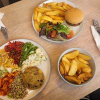 Platter: 'Fish' Cake Served With A Selection Of Salads, Bistro Burger, Chips and Salad and Side of Chips at Dragonfly Bistro in Aberystwyth