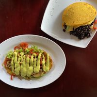 Bob Marley (Patacón pisa’o with vegetables) and arepa with red beans and vegetables  at Quero Arepa in Cartagena