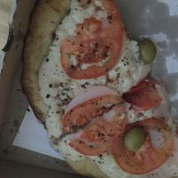 Ham pizza with tomatoes. Not recommended!!!! at Pizzeria Flipper in Buenos Aires