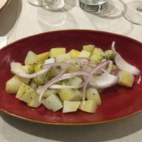 Insalata di patate, cipolla, olio, origano (Potato, onion, oil, origan salad) at Le Chat Noir in Cefalu