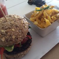 Black beans burger w/ avocado and sweet potato chips at Barraca Café in Lourinha