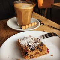 Trail Mix Flapjack and oat latte at Lion's Den in Haslemere