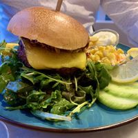 Beyond burger with a delicious sauce on top . Vegan at Aloha in Leiden