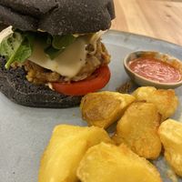 Green Burger and potatos (vegan) at Odacova in Barcelona