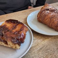 Cinnamon bun and almond croissant (croissant was served warm) at Plenty in The Hague