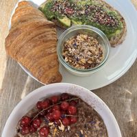 Avocado toast, croissant and yoghurt with granola. Chia bowl  at Plenty in The Hague
