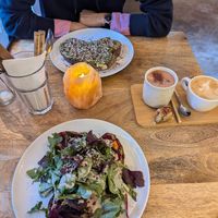 Sandwich avocado (top), Sandwich aubergine (bottom), Chico latte, Cappuccino at Plenty in The Hague