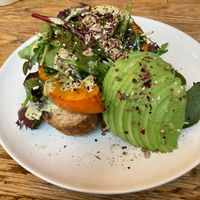 Pumpkin bread with additional avocado   at Plenty in The Hague