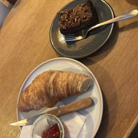 Sweet Potato Brownie 4,80€, Croissant 3,80€ Jam 1€ Butter 1€  at Plenty in The Hague