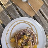 Pancakes and oat matcha lattee  at Plenty in The Hague