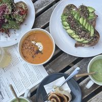 Soups and avocado toasts, cinnamon roll  at Plenty in The Hague