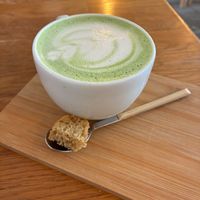 Matcha latte with a piece of vanilla cake: very good at Plenty in The Hague