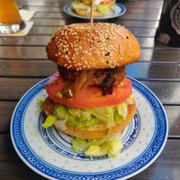 Green Boxi burger with tomato, lettuce, guacamole, caramelized onions and a beyond burger patty at Burgeramt in Trier