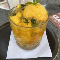 Mango sorbet with fresh mango, passion fruit and a passion fruit-mint lemonade.  at Brasserie BLVD in Vlissingen
