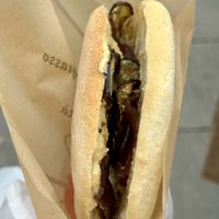 Sandwich with chickpea sauce, aubergine and caramelized onions  at La Foca Pia in Pisa