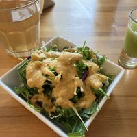 Lunch menu is served with this salad and green shot  at VegeHolic in Tokyo