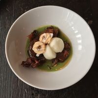 Veggies for dessert! Eggplants Foster cooked tableside with basil sauce, lemon ice, and eggplant thumbprint cookies.  at Dirt Candy in New York City
