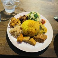 Taste tesing plate with a bunch of different sauces; tofu, tempeh etc. Awesome. I asked for extra salad and got it  at Sayur in Gothenburg