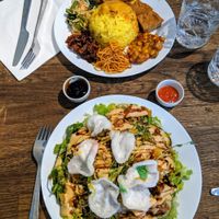 Mixed plate (top) with tofu, tempeh, noodles, rice and more I can't remember exactly. Sallad (bottom) with tofu, tempeh, rice, potato and peanut sauce. at Sayur in Gothenburg
