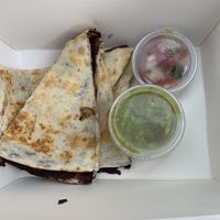 Black bean quesadilla with vegan sour cream, guacamole and pico de Gallo  at High Note Cafe in Boise