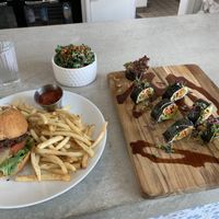 Mushroom walnut burger and vegan sushi. The burger is one of the best vegan burgers I ever had   at Verdine in Houston