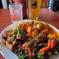 Red curry, jerk chicken and kale salad at Good Karma Artisan Ales & Cafe in San Jose