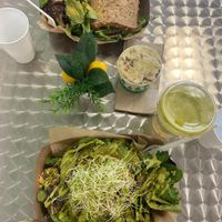 Highly recommend! The most fresh, flavorful lunch! Vegan crab cake, egg salad sandwich, potato salad, zinger juice all pictured here and delicious!  at Seed to Table Vegan Eatery in Venice