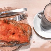 Tostadas con tomate y café con leche de soja at Capitol in Ferrol