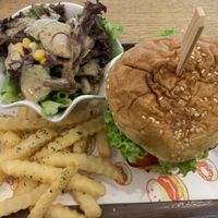 Hawaiian burger with a salad and French fries  at Green Ba - Somerset in Central Singapore
