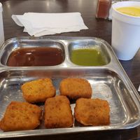 Paneer pakodas and mango lassi at Shiv Sagar in Houston