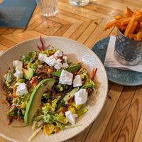 Salad with lots of veggies and vegan feta, sweet potato fries at LGW - Sonoma - NT  in Horley