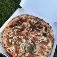 Delicious pizza. Half Salami Funghi half tuna onion at Pizzeria Trattoria Sorrentino in Cologne